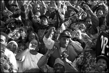 Hip hop fans watching Doug E Fresh perform